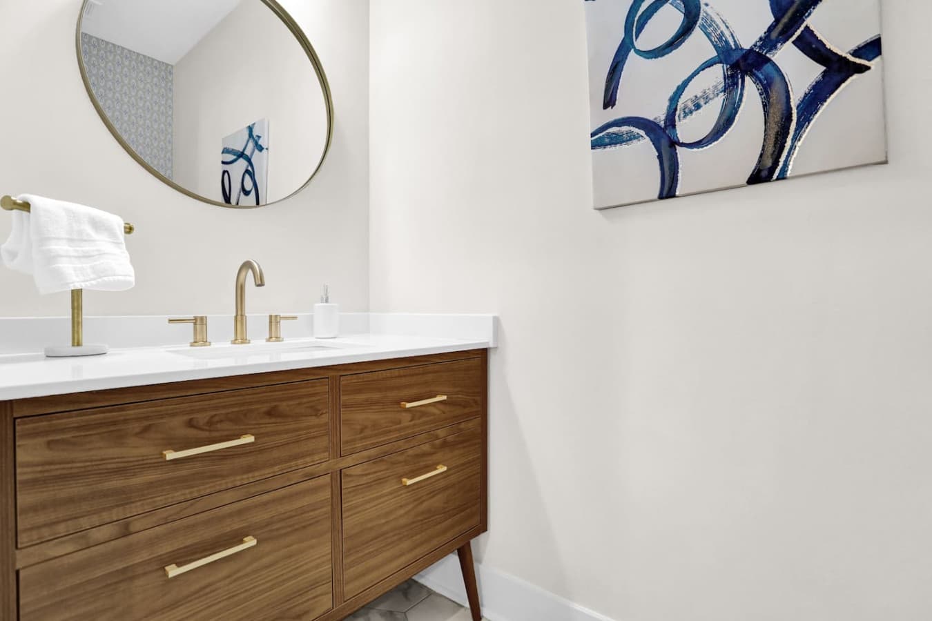 Small but mighty—this half bathroom is perfect for quick refreshes