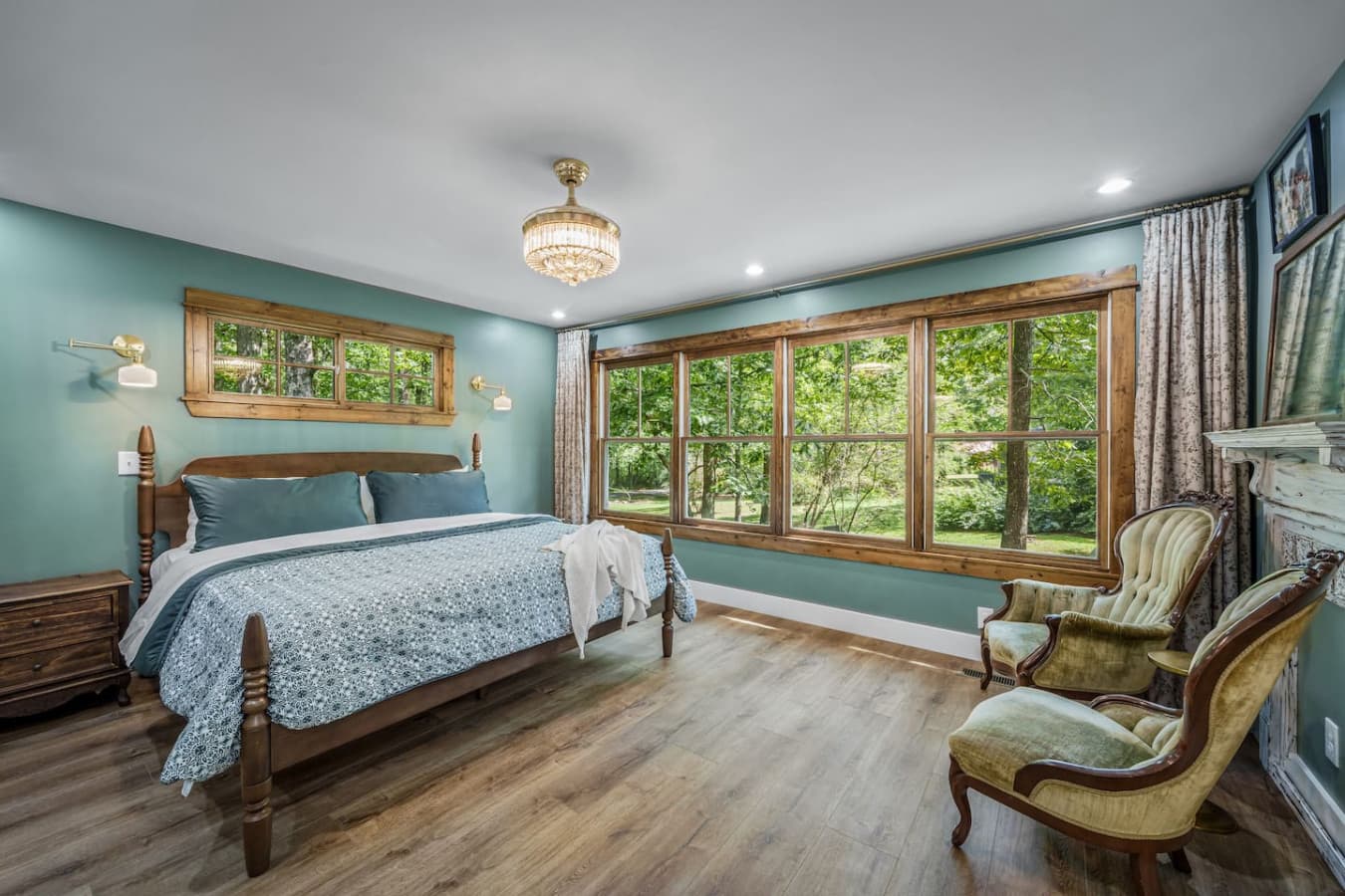 Sleep soundly in this spacious, serene king bedroom—designed for your ultimate comfort. Bathroom 1 is attached to this room.