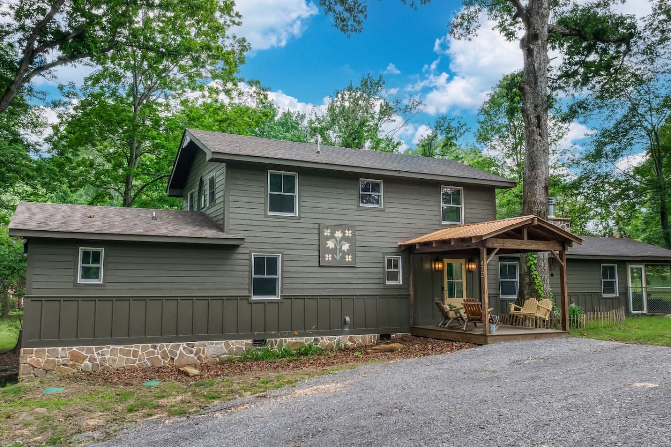 Sun’s out, fun’s out—your mountain getaway awaits, complete with mountain vibes and a welcoming porch.