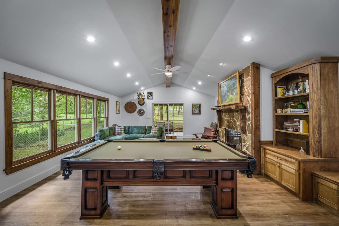 Who needs a bar when you have a pool table for real entertainment?