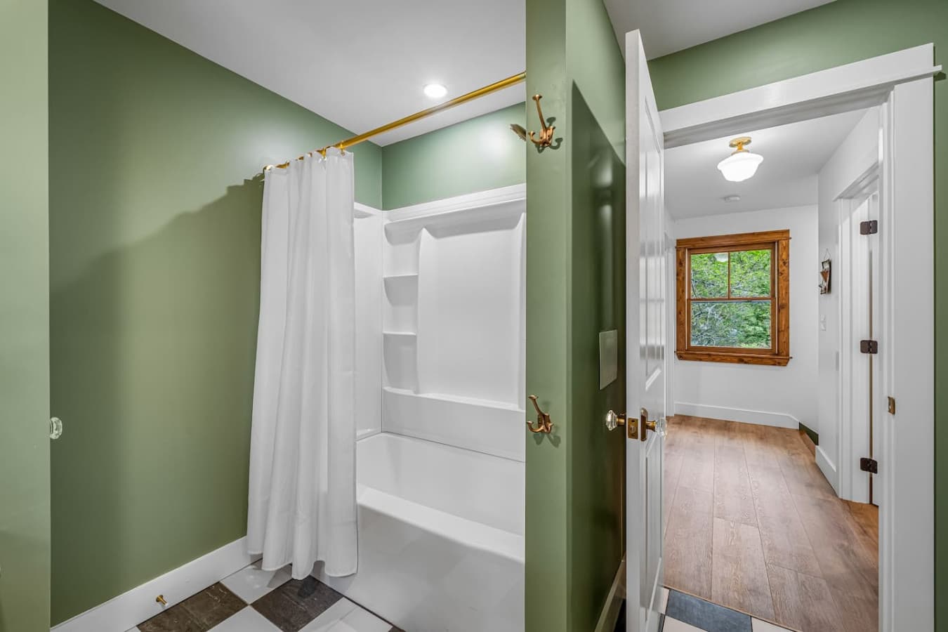 Whether you prefer a relaxing soak or a quick shower, this bathroom has you covered.