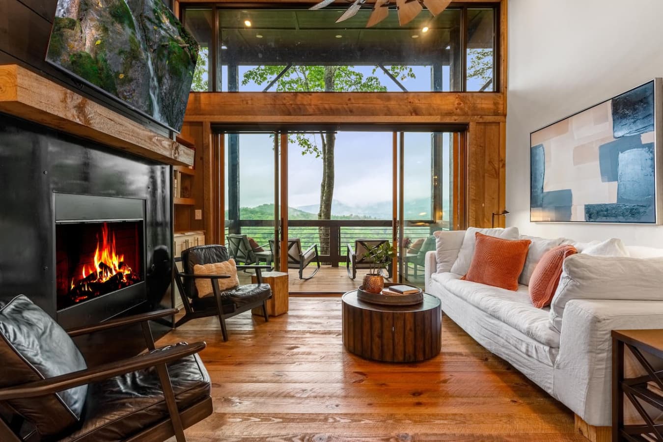 Warm up by the fire, sink into the plush seating, and enjoy panoramic mountain views—all in refined comfort.