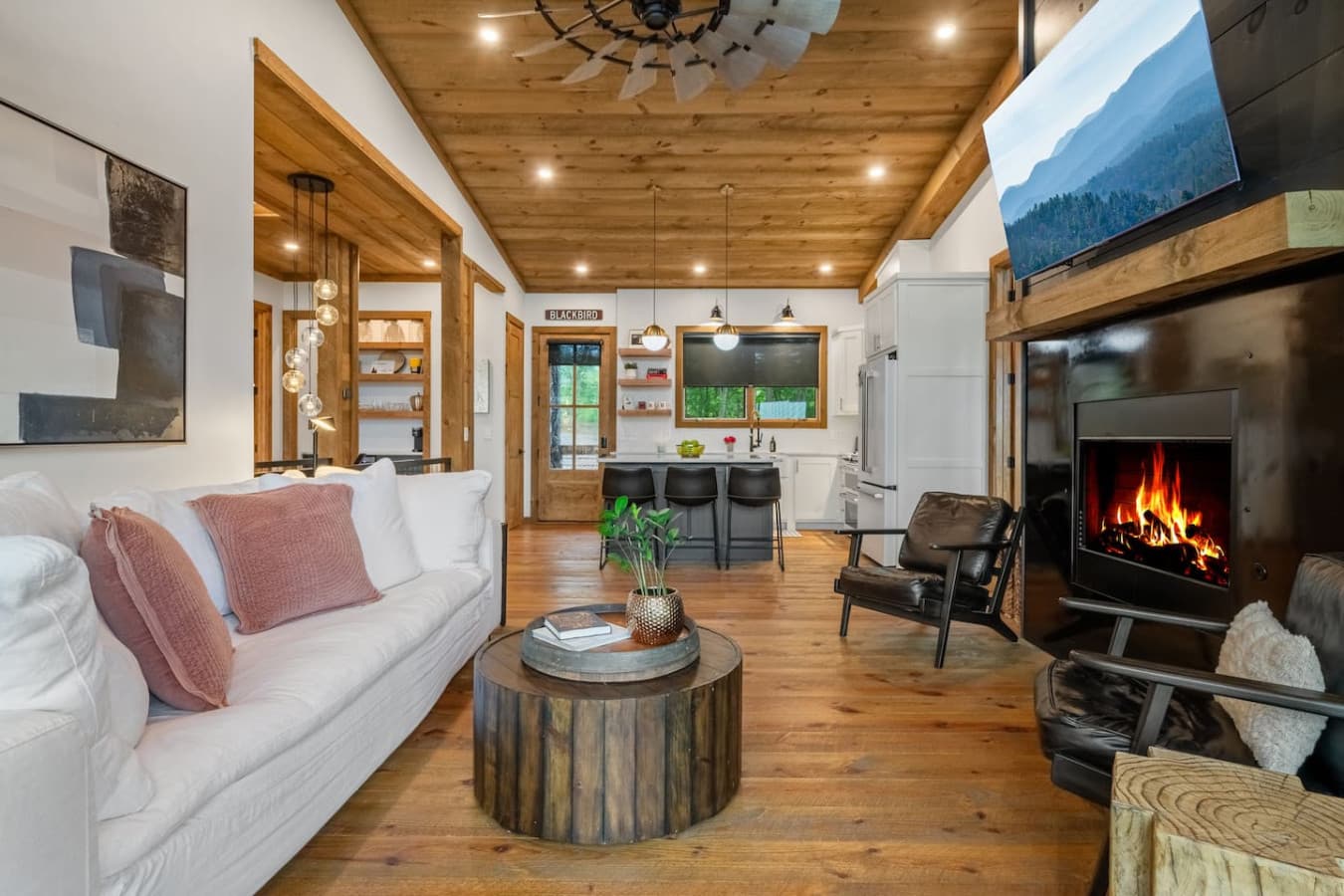 Framed by mountain light and grounded in comfort, this living room is the definition of elevated relaxation.