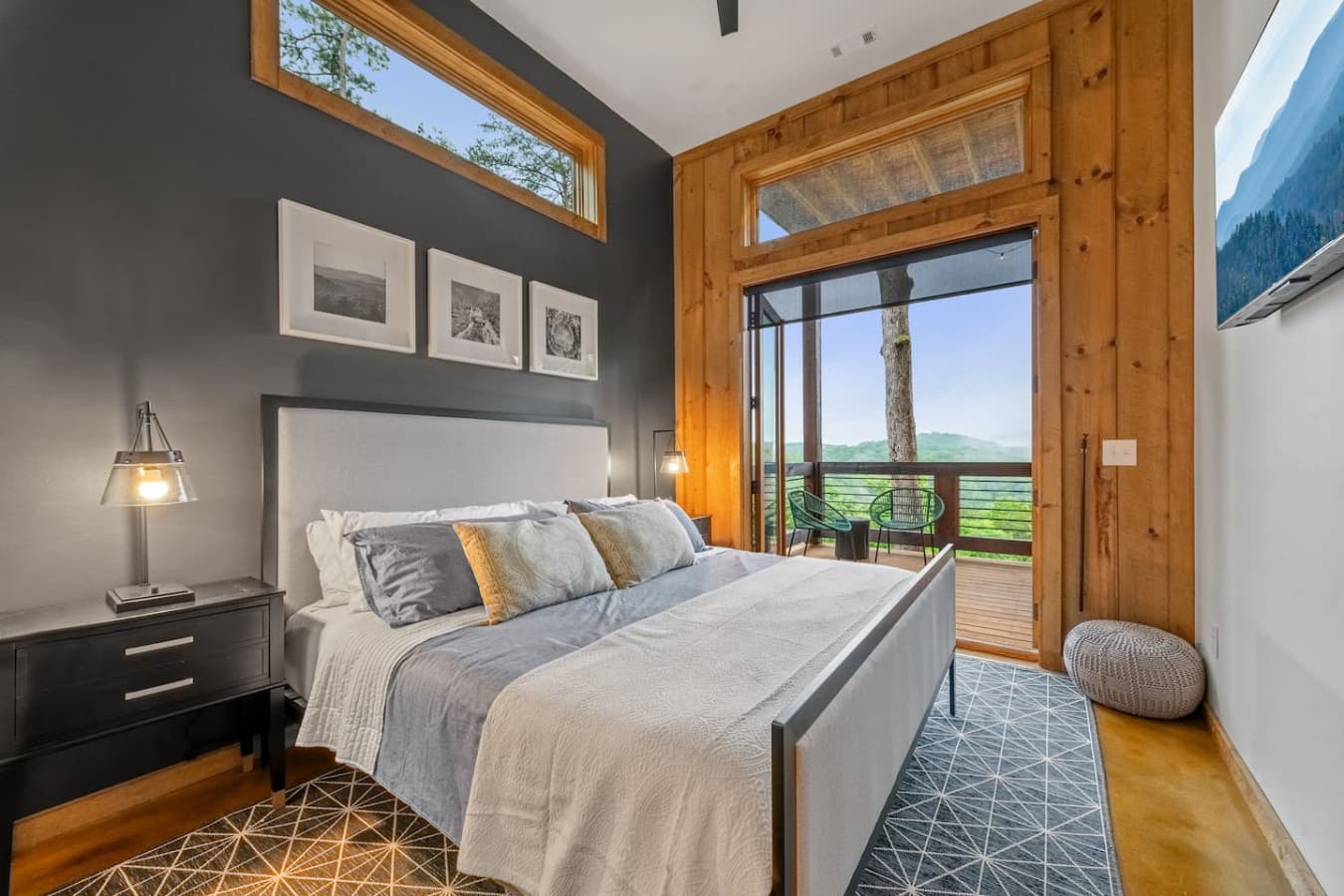 Tranquil tones, luxe bedding, and a front-row seat to the mountains—this is what cabin dreams are made of.