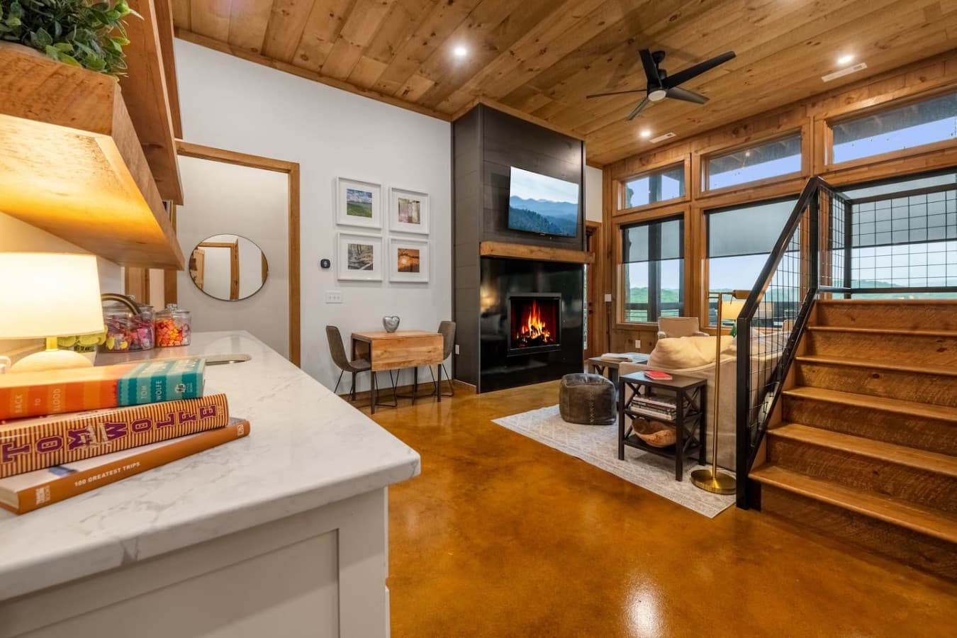 Timeless design, a crackling fireplace, and endless views—this space brings luxury and comfort into perfect balance.