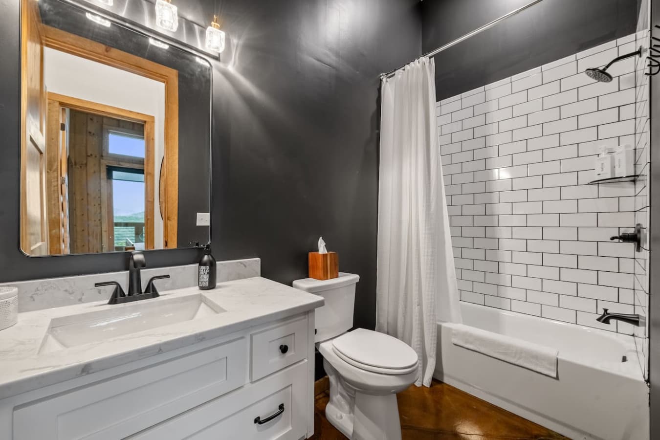 Sink into serenity with a warm bath in this beautifully designed tub—your own personal sanctuary.