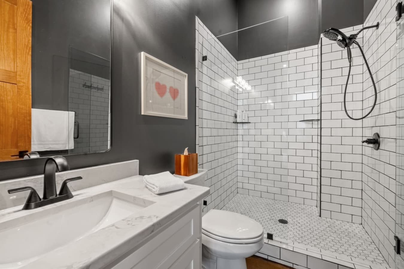 Step into pure serenity—this spacious walk-in shower offers a rejuvenating experience every time.