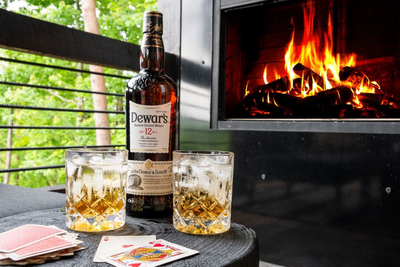 Drinks, Cards, and Balcony Fireplace: Let the fire crackle, the cards shuffle, and the drinks flow—this is what mountain evenings were made for.
