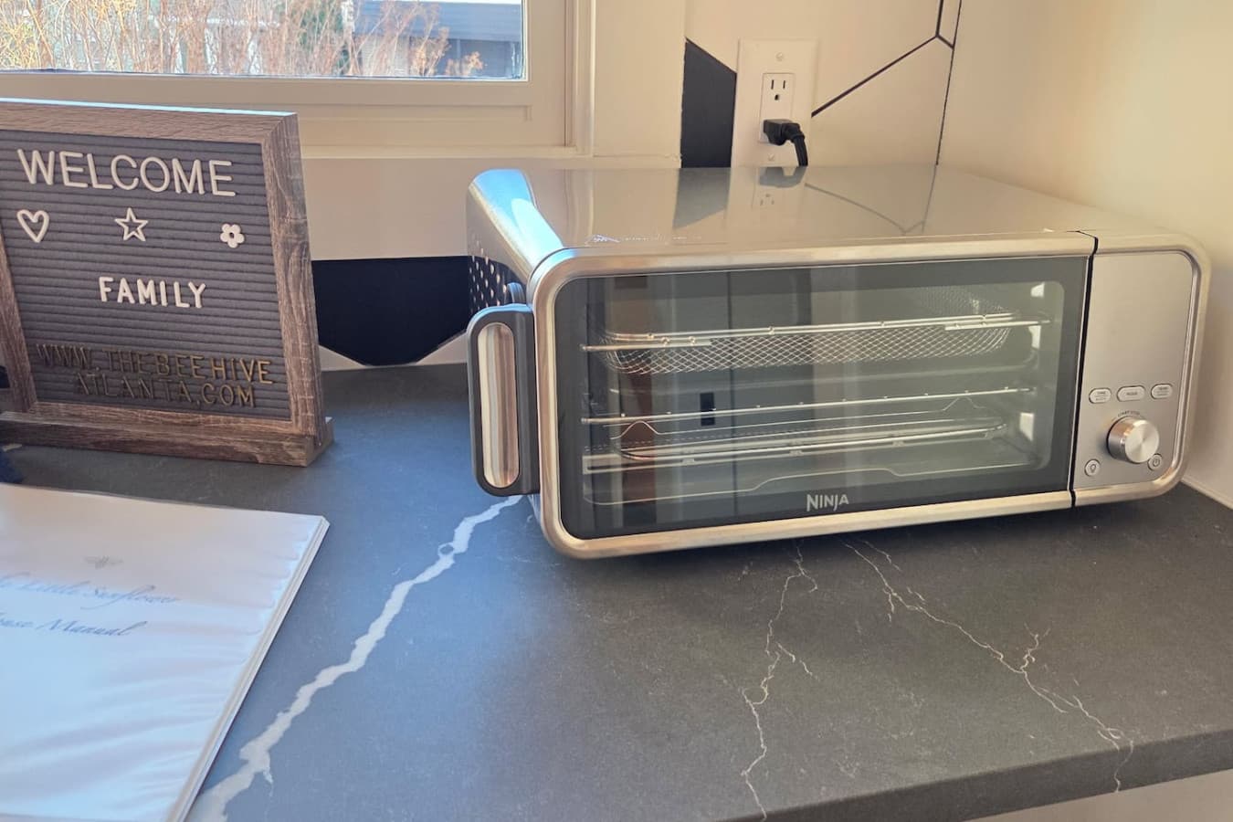 Ninja countertop air fryer oven for versatile cooking.
