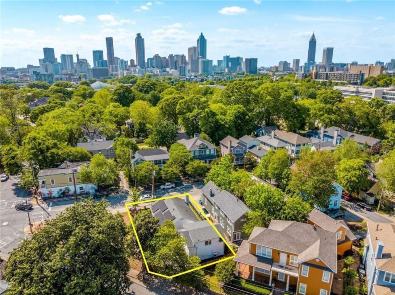 This aerial view shows just how close you are to the heart of Atlanta—Midtown’s skyline rises in the distance, with The Little Sunflower nestled quietly below.