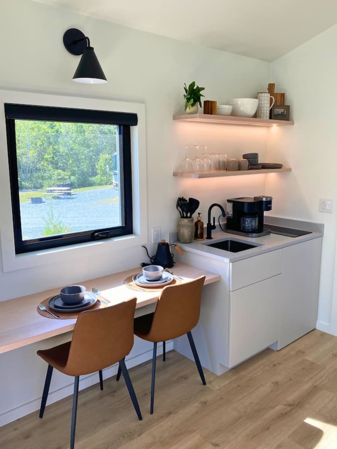 A charming dining nook for two — perfect for morning coffee, a seafood dinner, or a quiet evening in.