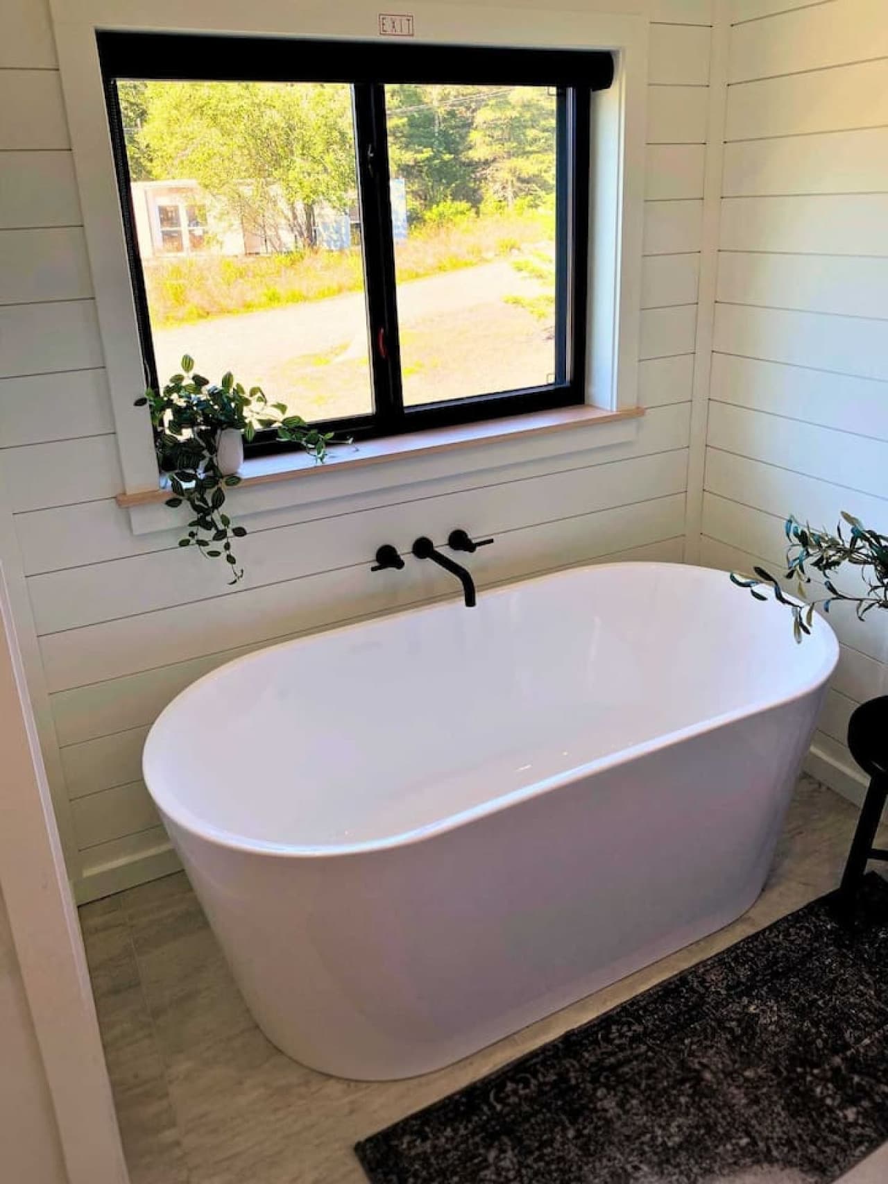 Soak and unwind in the deep tub — the perfect way to end a day by the bay.