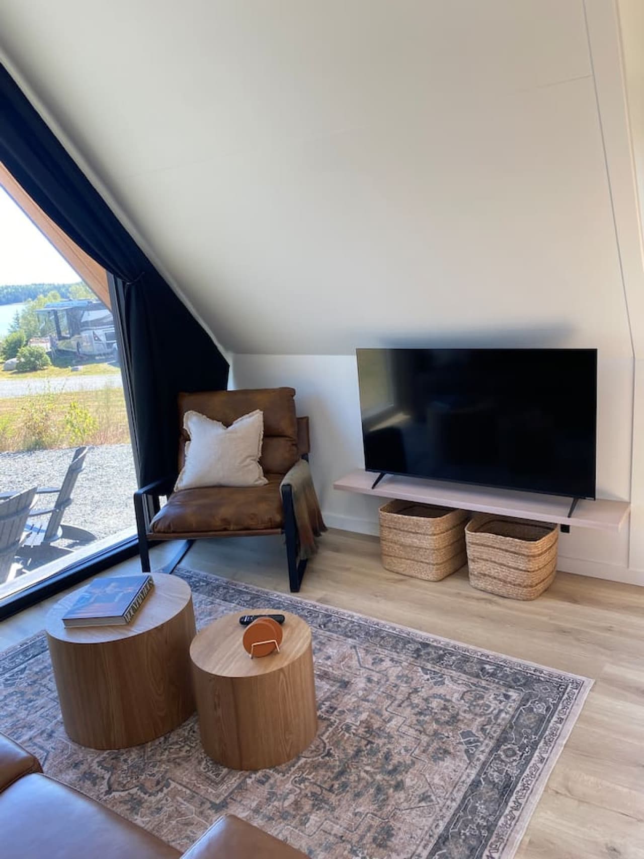 Bright, simple, and serene — this cozy living space offers modern comfort with a touch of Maine’s coastal beauty.