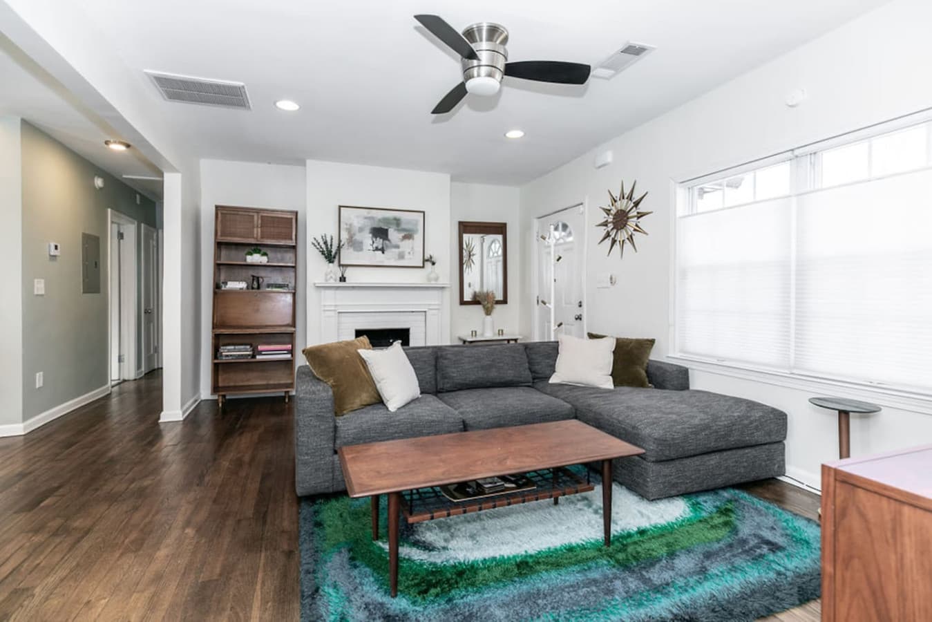 A versatile layout designed for easy conversation and cozy nights .