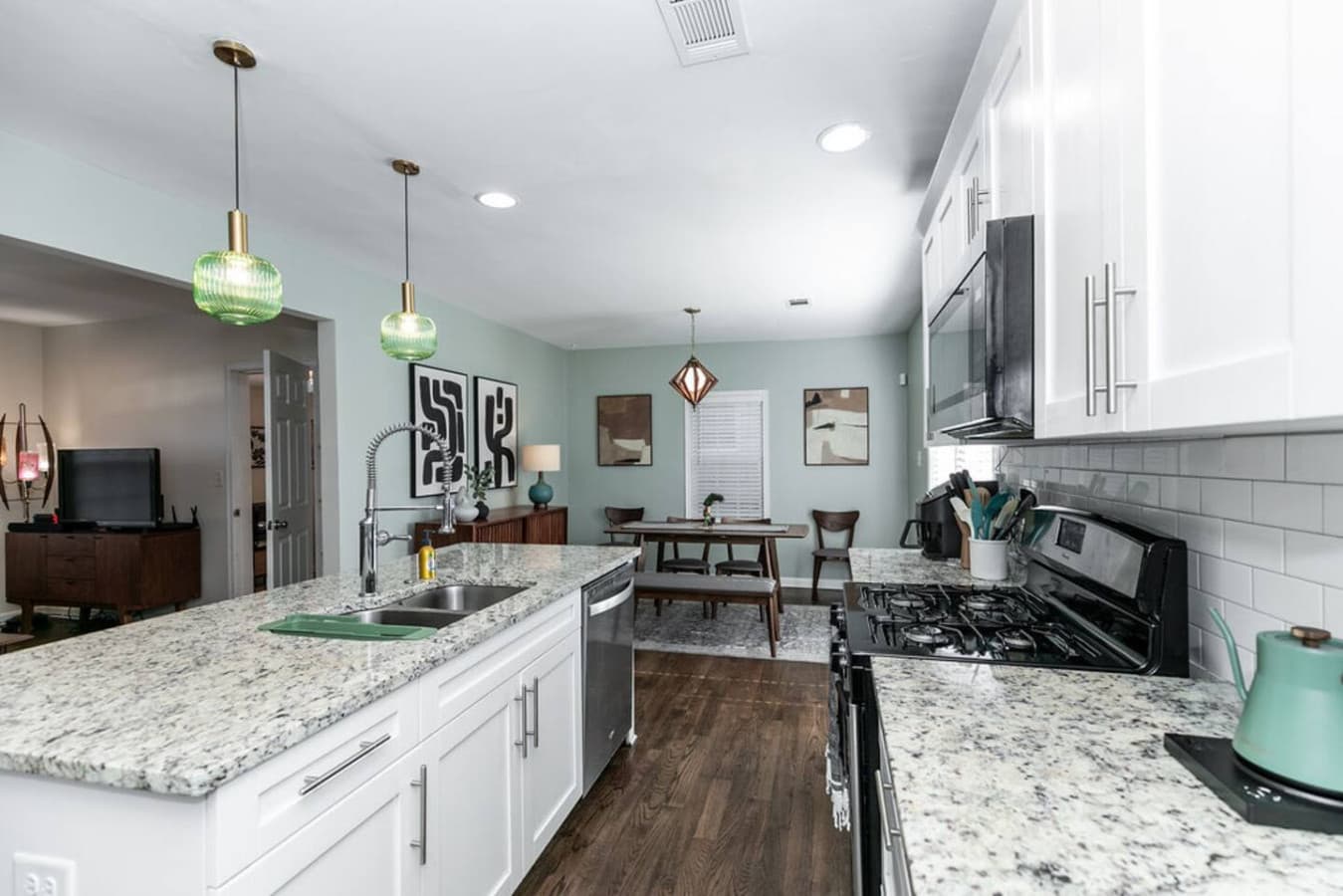Chef’s kitchen with a seamless flow into the dining area.