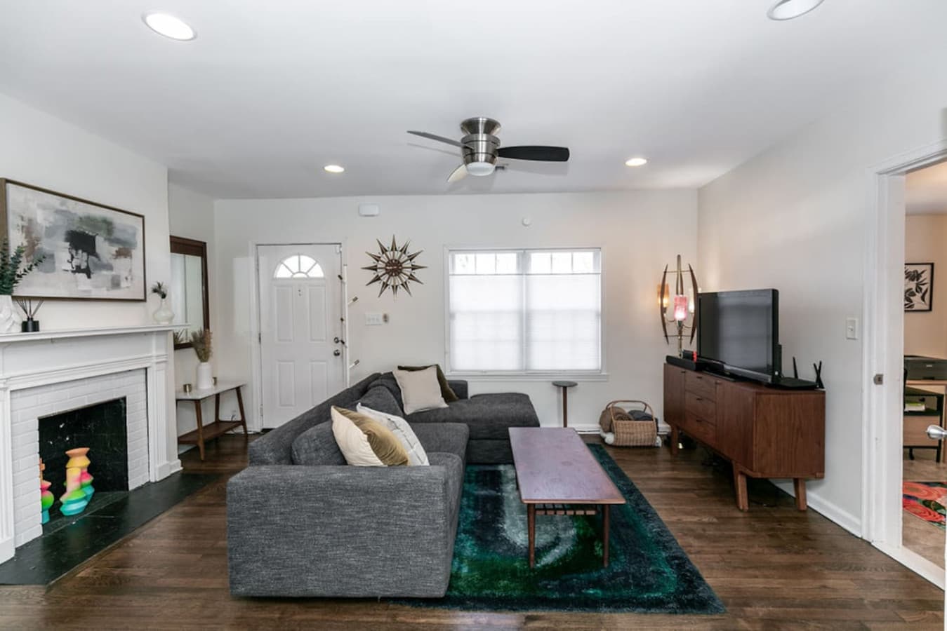 Flooded with natural light, this living area feels bright and airy throughout the day.