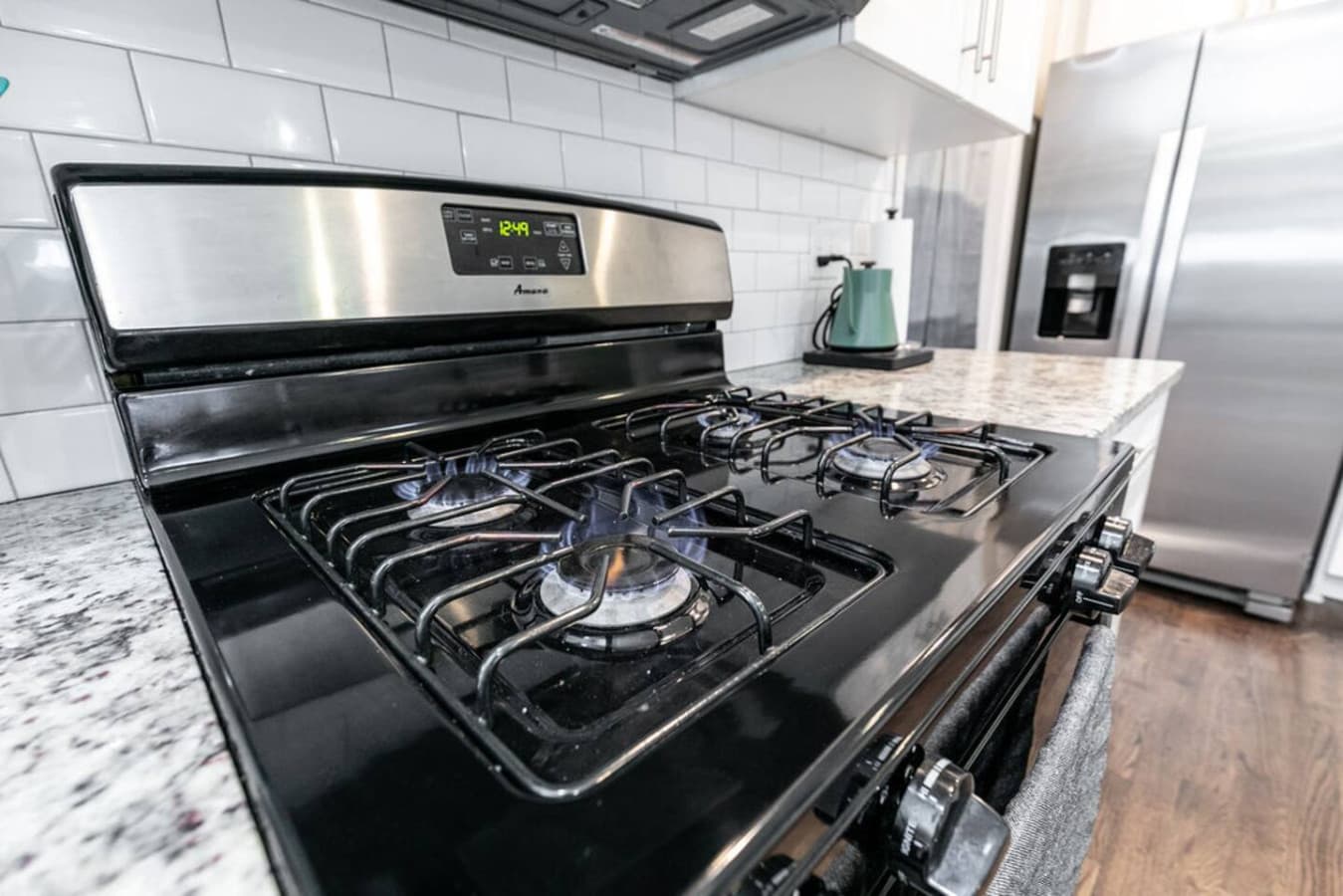 Gas range ready for cooking meals at home.