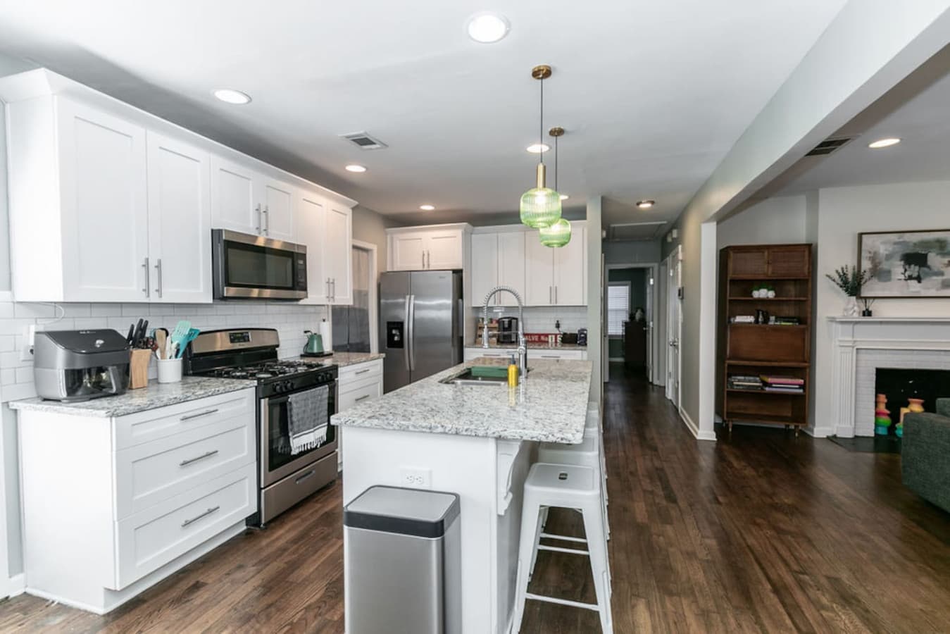 A panoramic view of the kitchen’s thoughtful design.