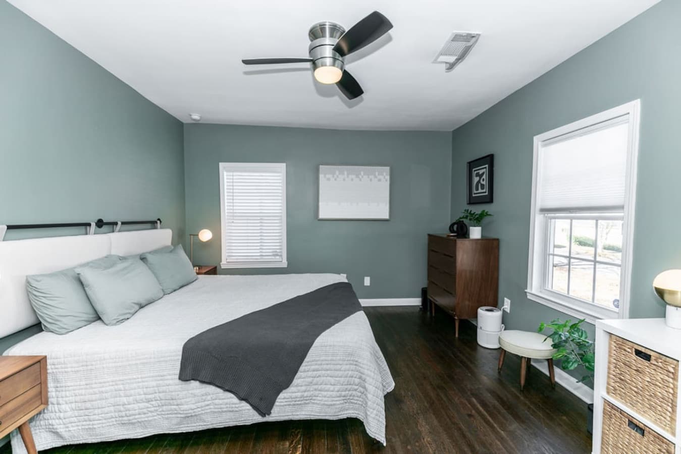 Wake up to gentle morning light in the primary bedroom, that offers plenty of space for relaxation.