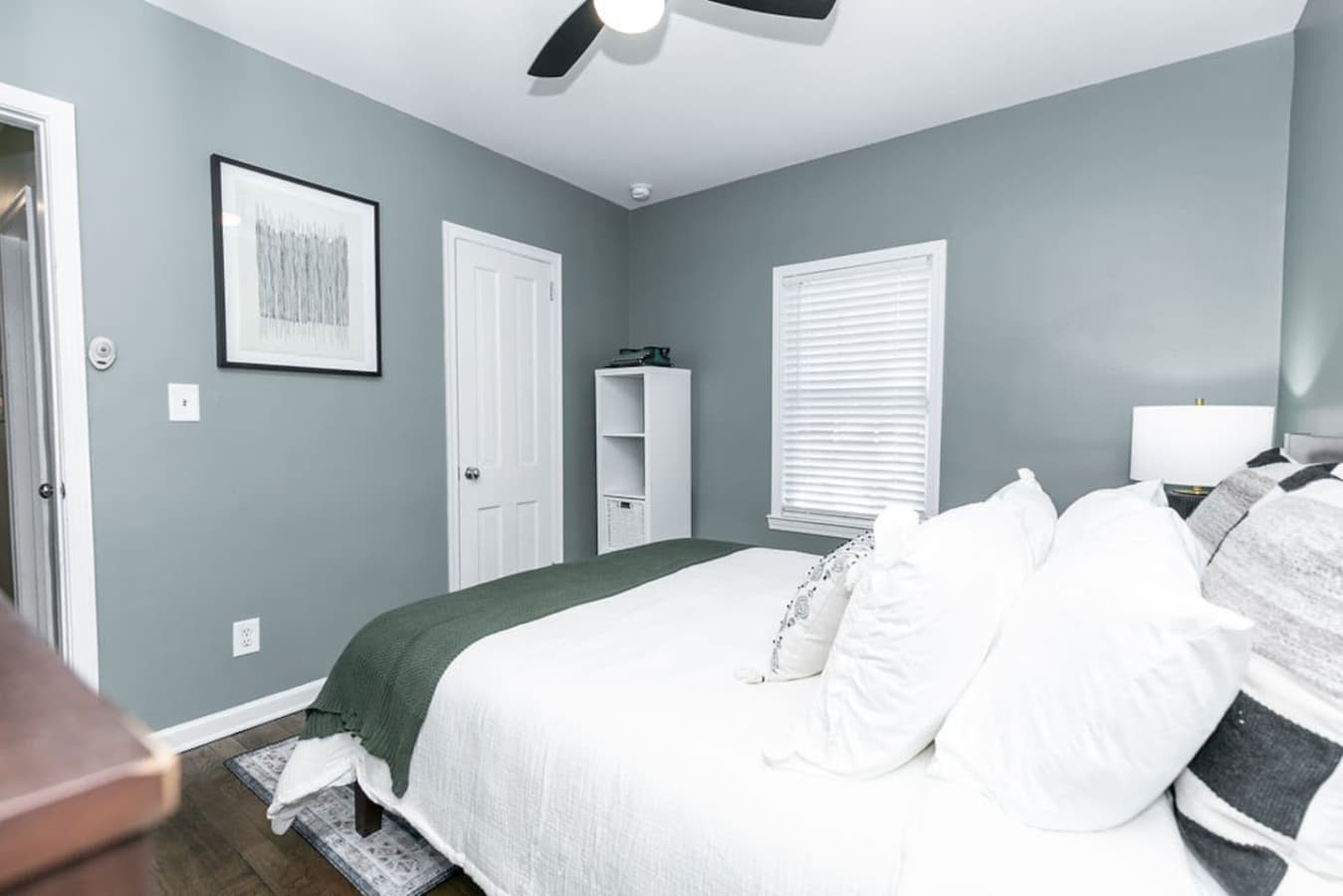 Light-filled guest room with a comfortable setup.