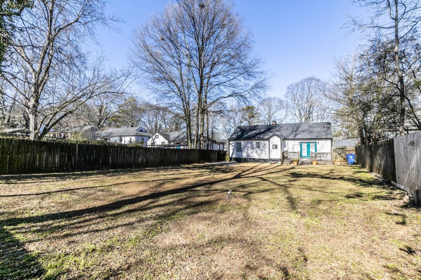Large backyard, perfect for pets, games, or relaxing.