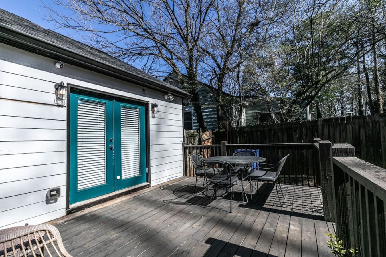Transition effortlessly to the private rear deck via French doors—your new favorite spot for morning coffee or alfresco dining.