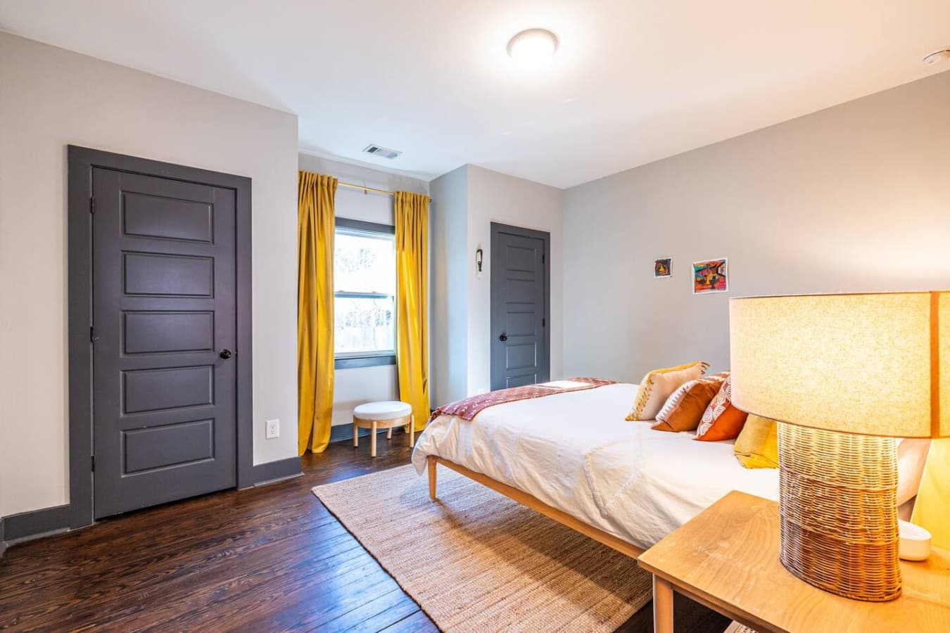A serene space with a queen bed, perfect for a relaxing night’s sleep.