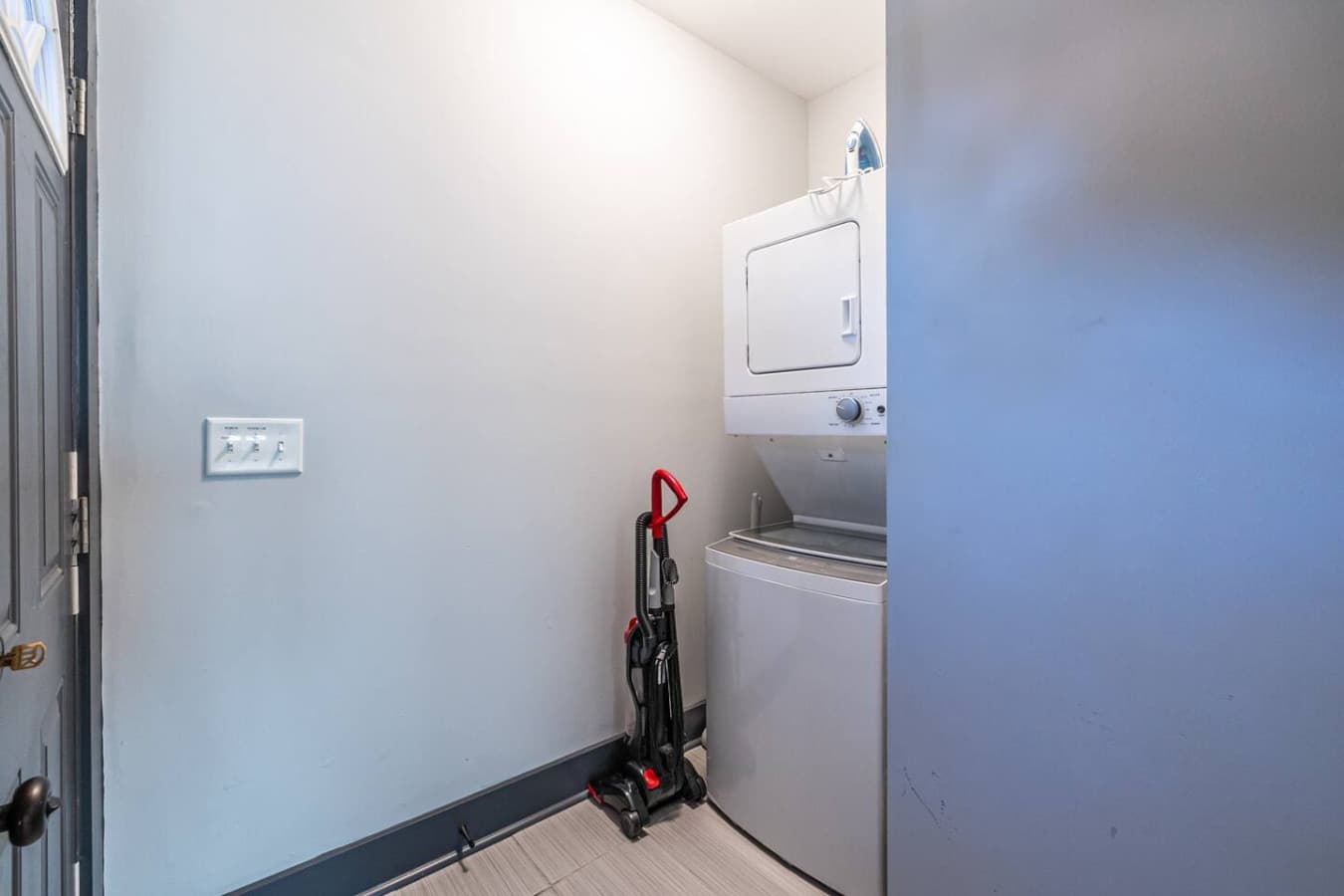 Keep things tidy with this back-door laundry nook and mudroom, designed for both convenience and functionality.