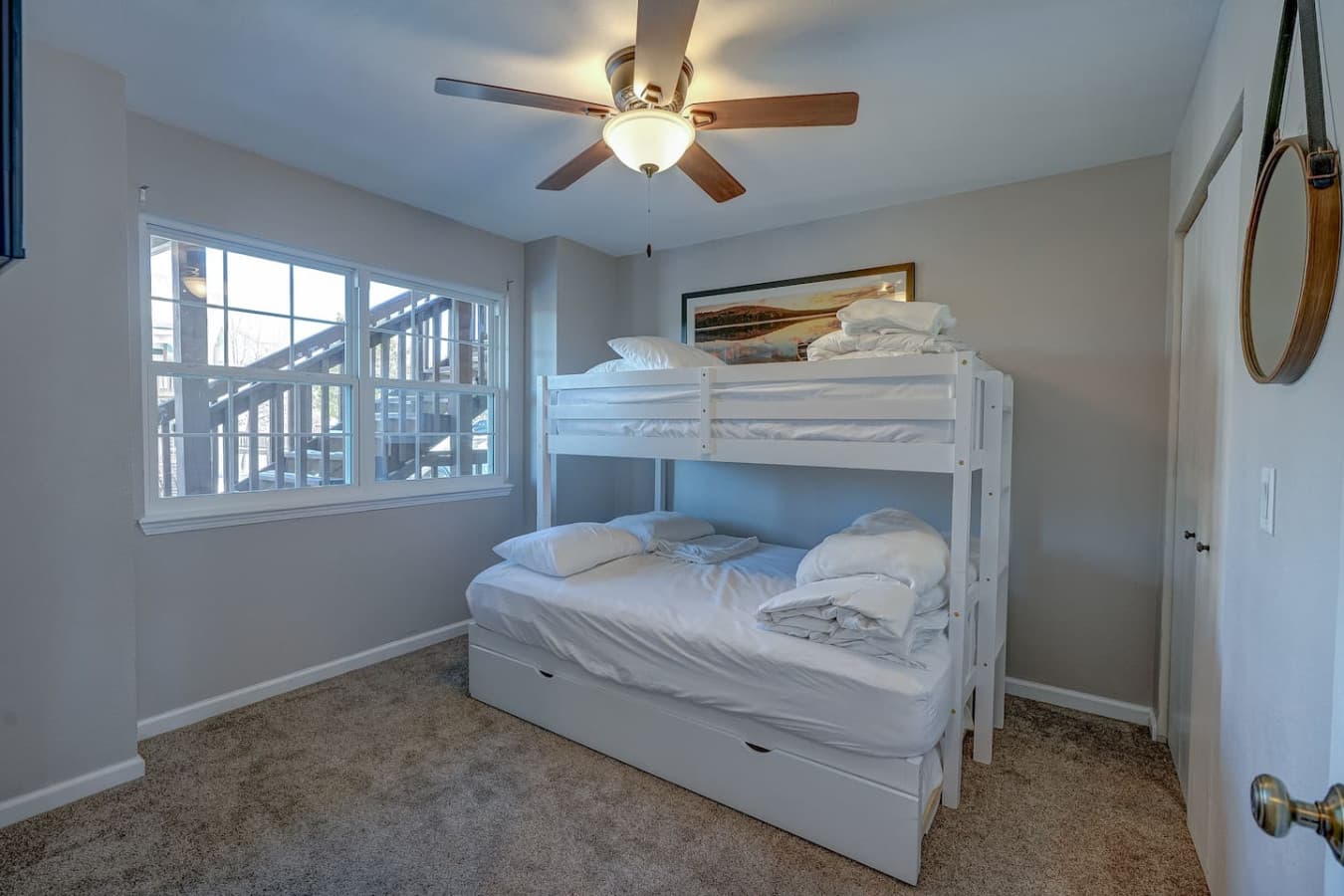 Ideal for kids or friends, these bunk beds bring comfort and adventure together. The top bunk is a single bed, the bottom bunk is a queen bed that comes with another single pull out, making it 3 beds total!