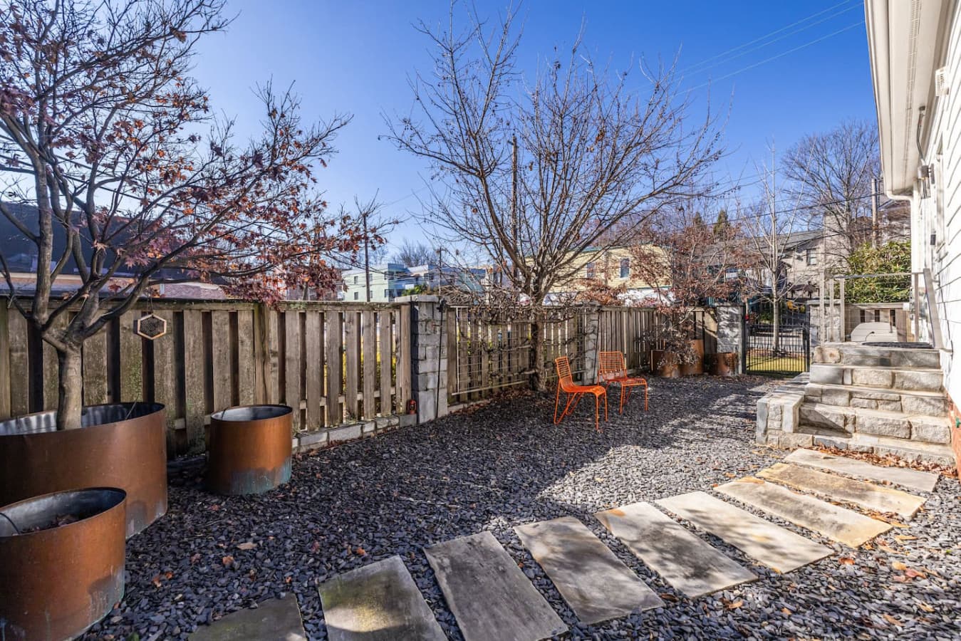 Enjoy the beautifully manicured side yard, perfect for relaxing outdoors.