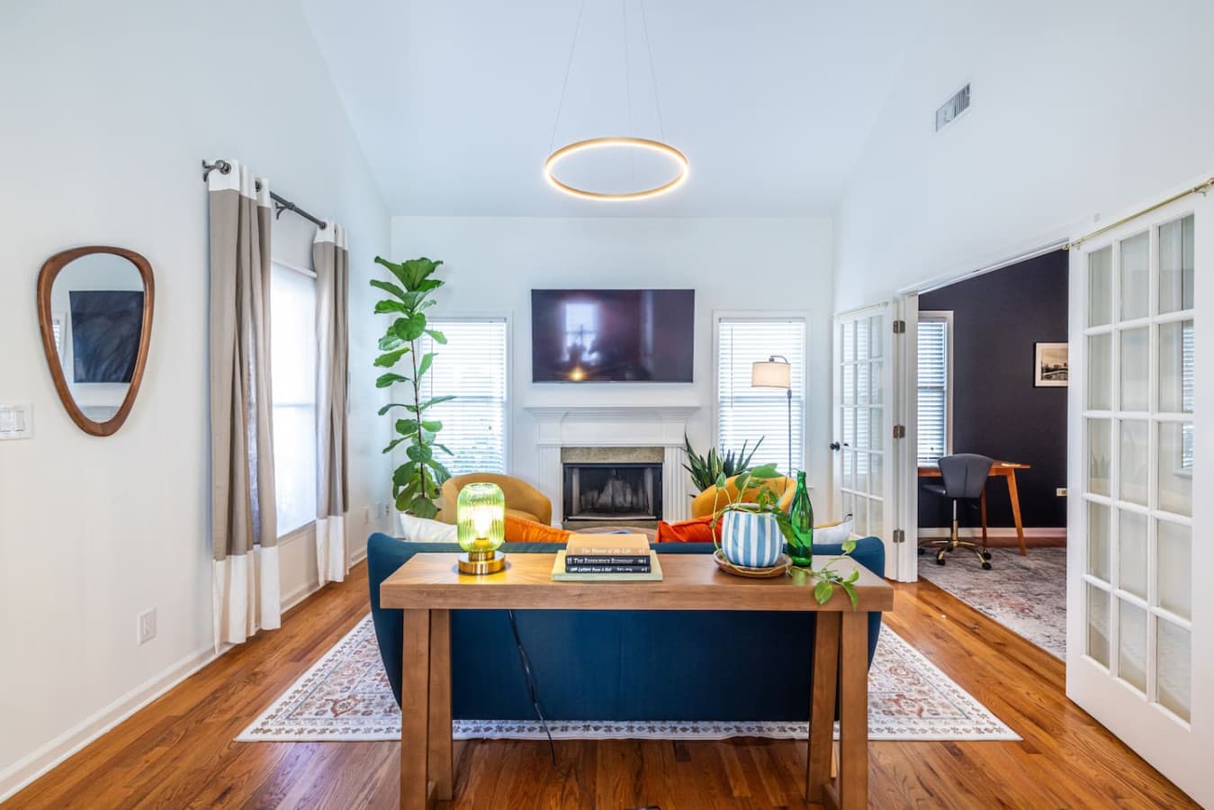 Bold accents and thoughtful details create a space that feels warm, creative, and lived-in.