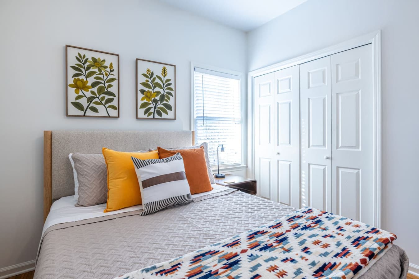 Bright, airy bedroom designed for rest and relaxation.