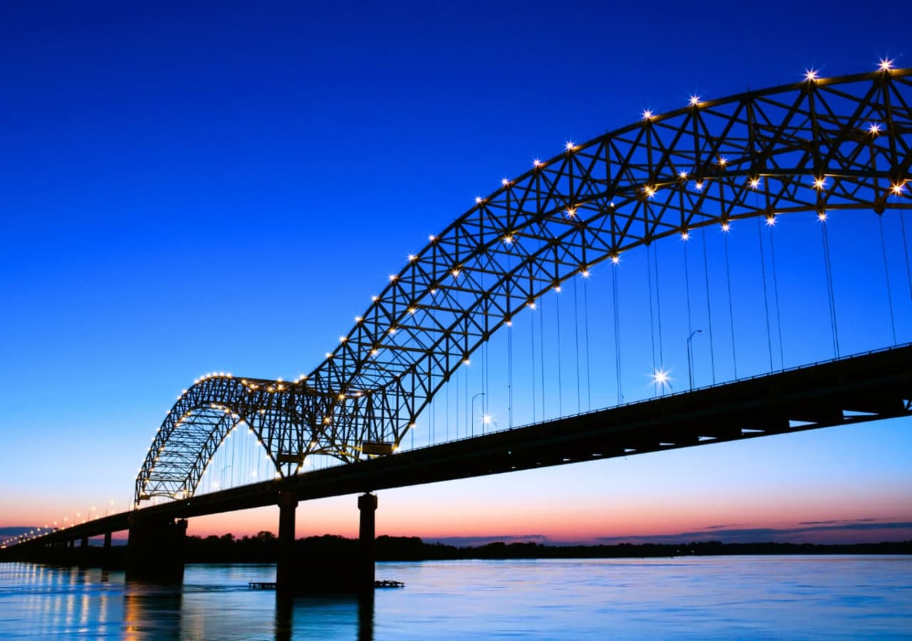 The Memphis Bridge is an iconic structure spanning the Mississippi River. Its stunning light displays at night make it a must-see for photos, and it offers breathtaking views of the river and downtown Memphis.