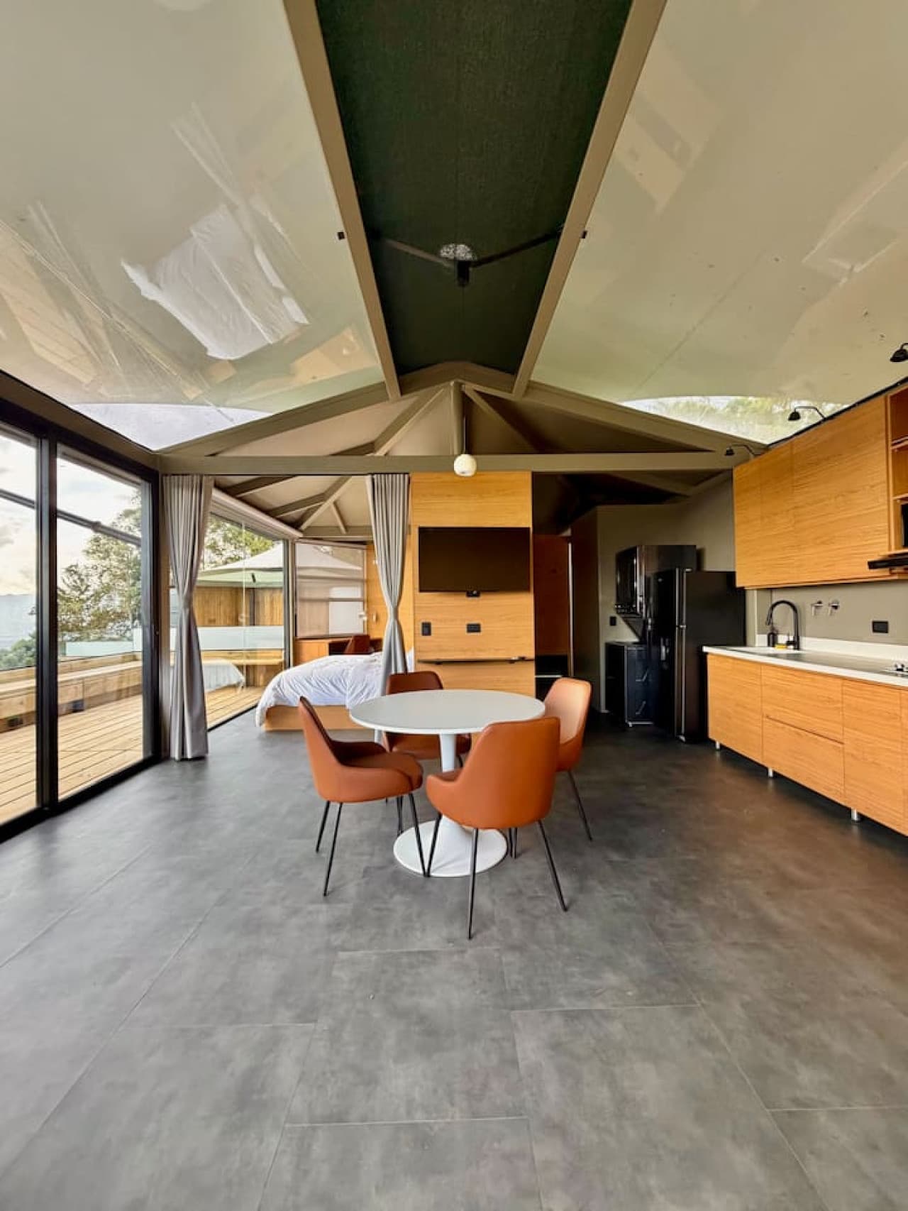Enjoy meals with a view in this cozy dining space designed for connection and comfort.