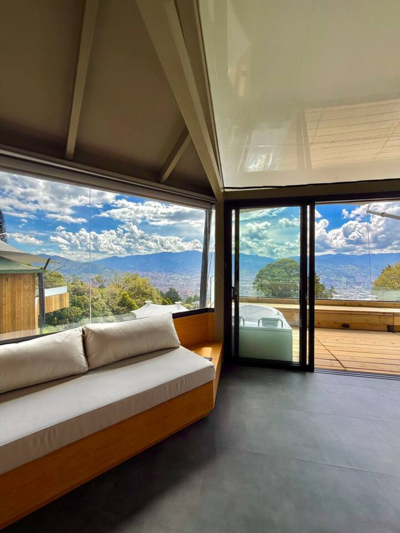 Relax in a bright, open living space where modern design meets panoramic views.