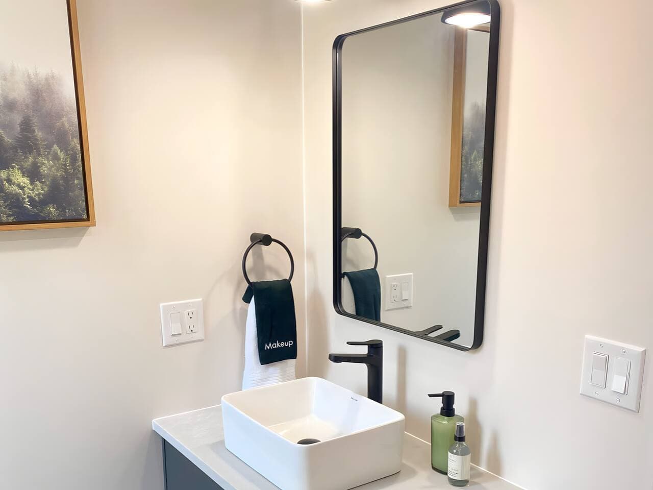 A clean, spa-inspired space with a walk-in shower, modern fixtures, and fresh towels for a refreshing start or end to your day.