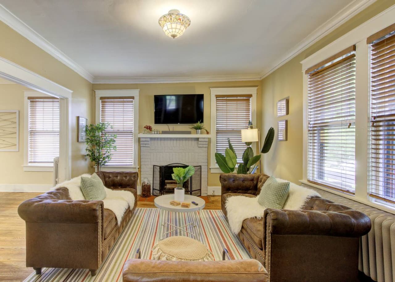 Spacious living room with a sofa and Netflix ready to be streamed!