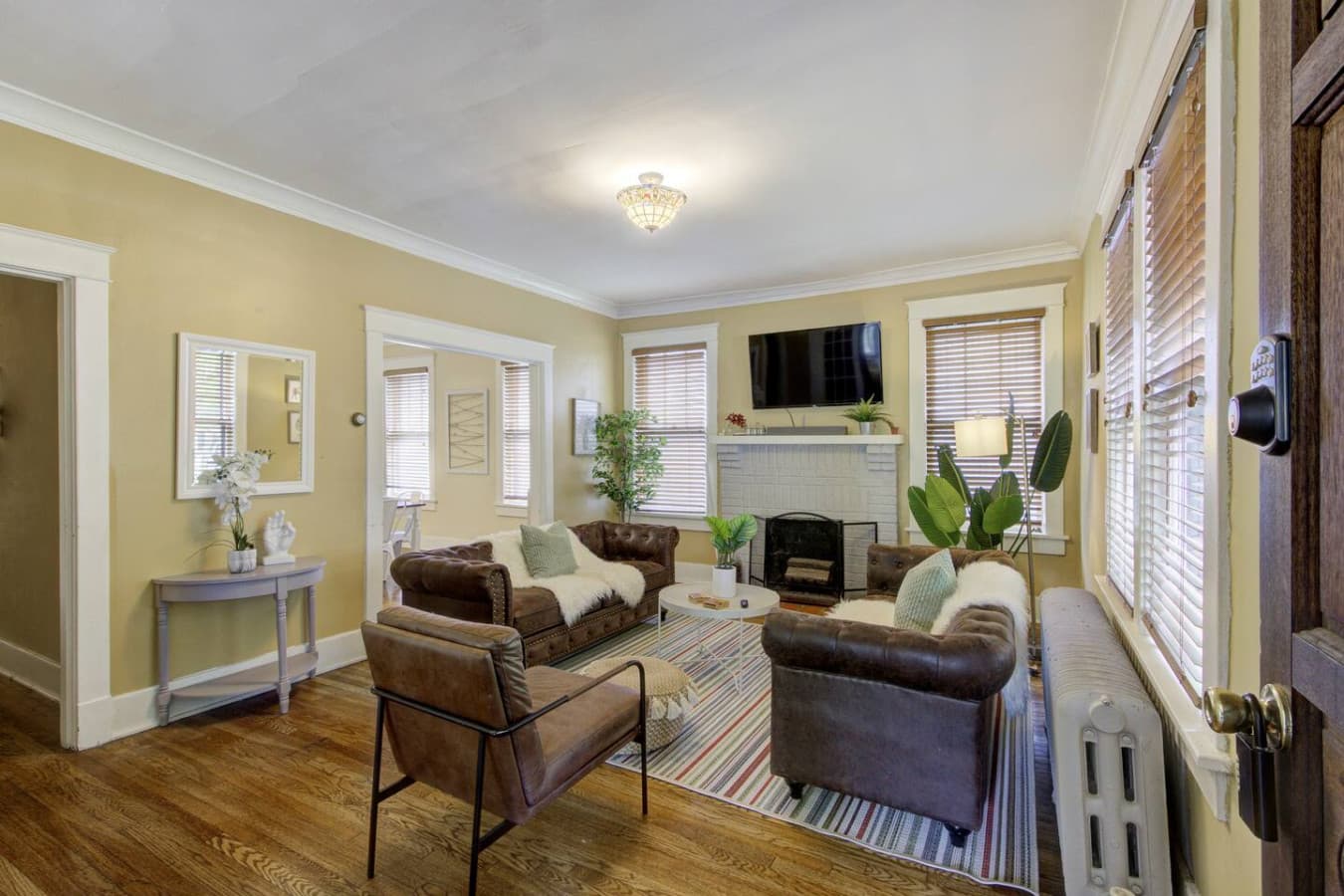 Beautifully furnished living area with a blend of comfort and classic charm.