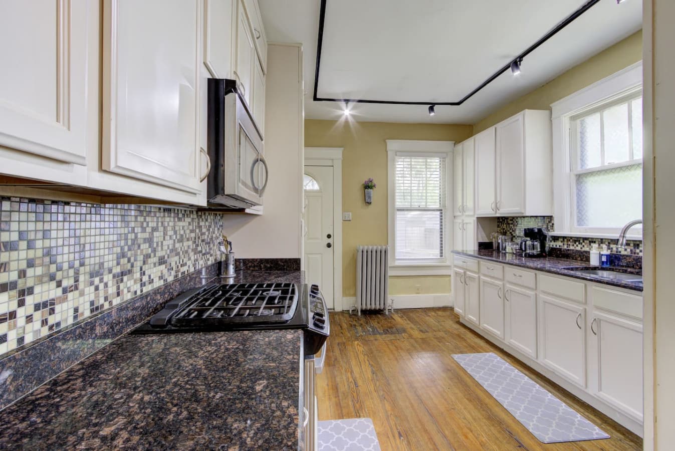 Full-sized oven, stove, and refrigerator for your perfect every day meal.