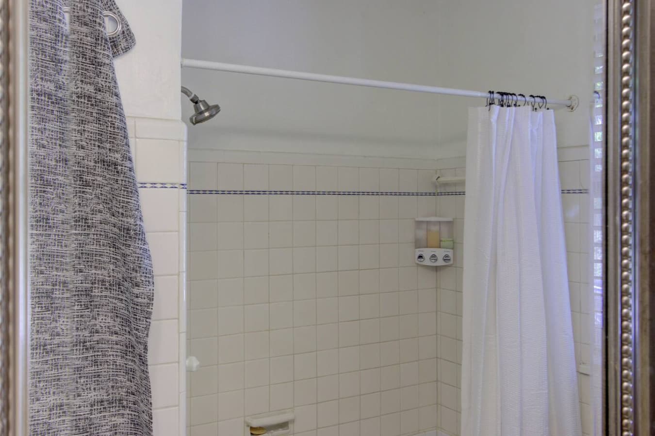 Whether you prefer quick showers or slow soaks — this bathroom has you covered.