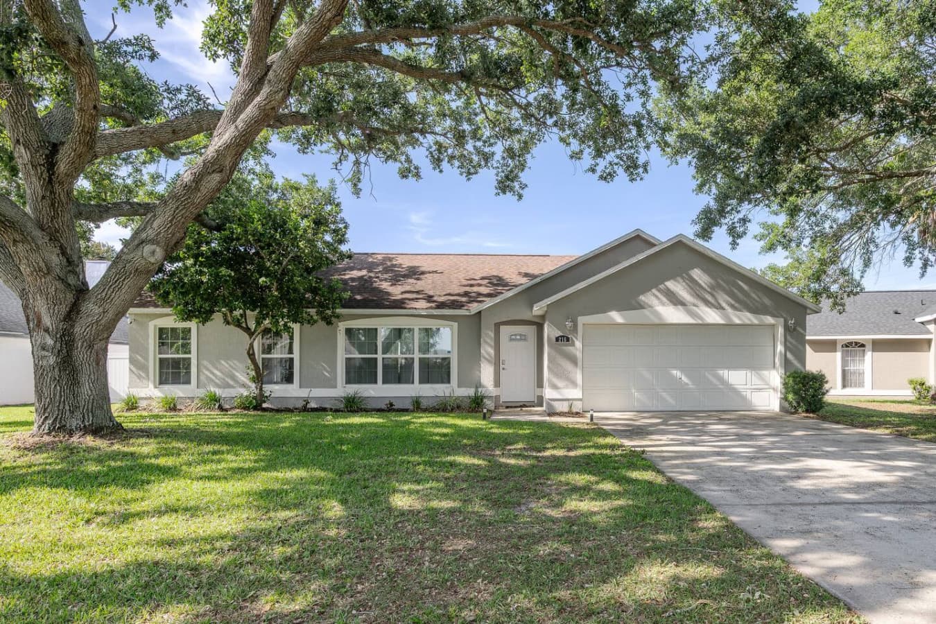 A classic single-level home with timeless curb appeal and a welcoming presence.