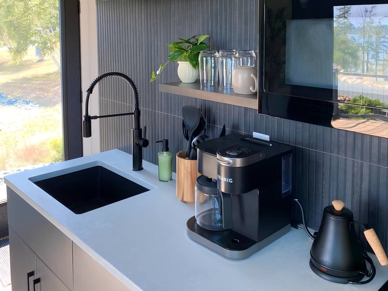 Modern and fully stocked with essentials — from a coffee maker to cookware — making it easy to prepare meals between coastal adventures.