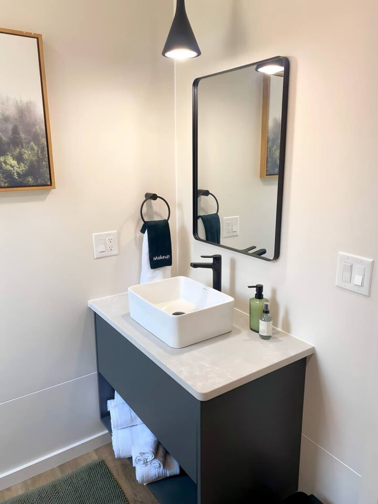 A clean, spa-inspired space with a walk-in shower, modern fixtures, and fresh towels for a refreshing start or end to your day.