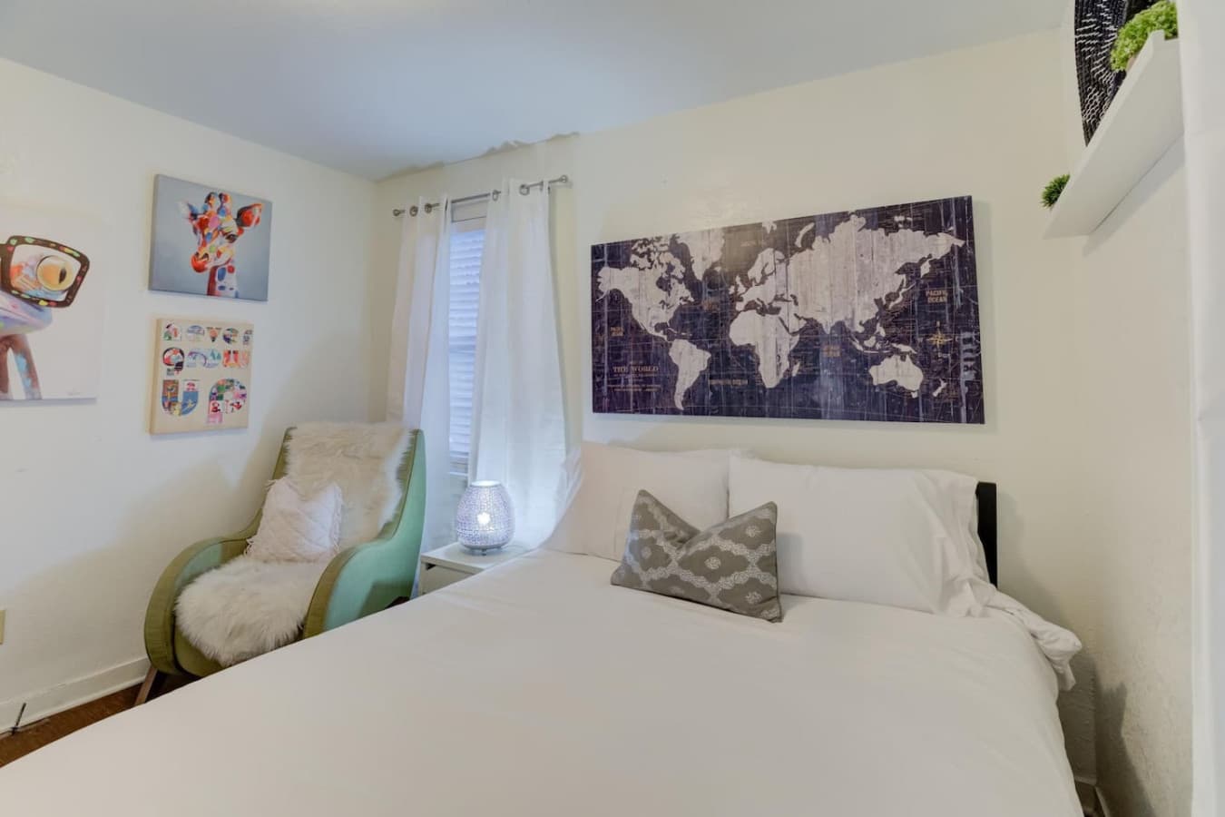 Queen bed, cozy mood, and all the Memphis magic.