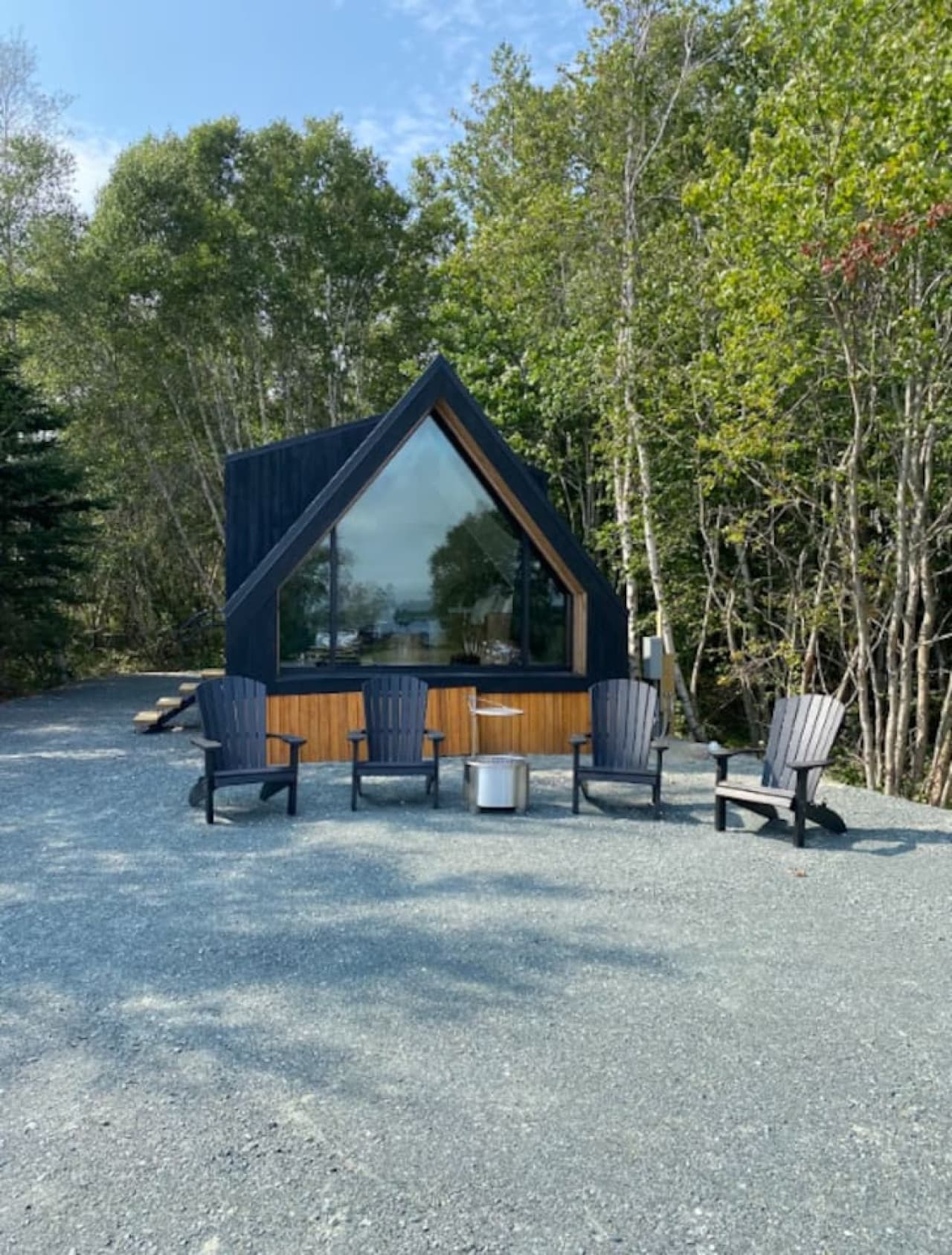 Charming A-frame cabin nestled in nature — where cozy design meets rustic adventure.