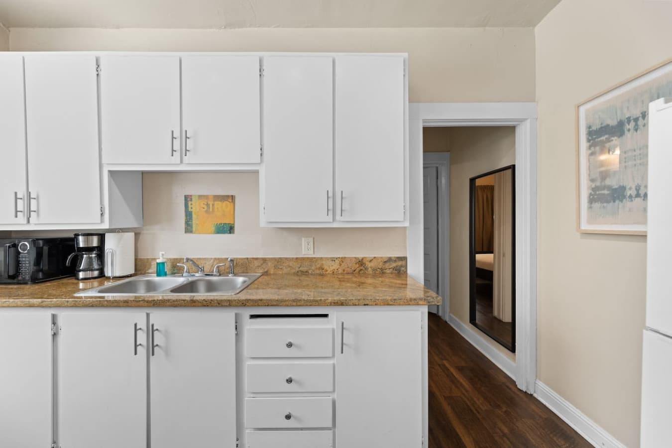Enjoy effortless cooking with ample counter space and plenty of shelving for storage.