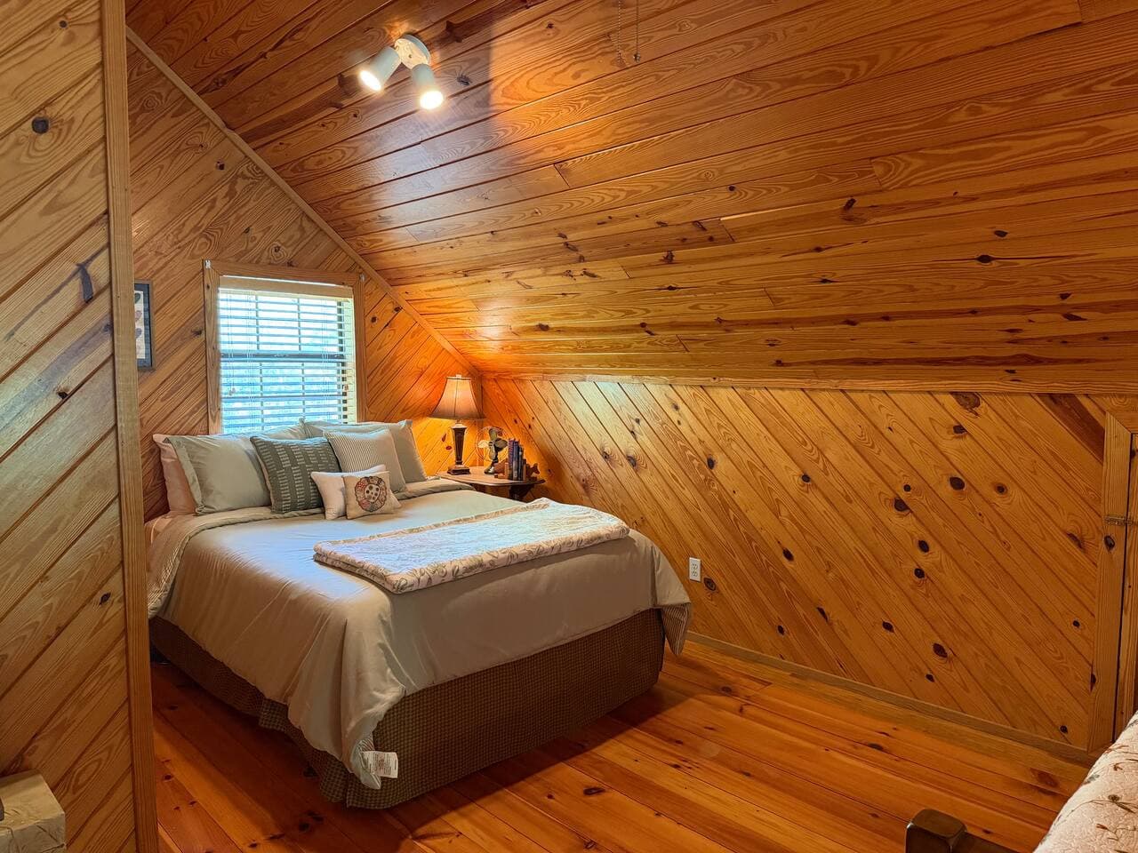 Nothing in the way—just a queen bed ready for real rest.