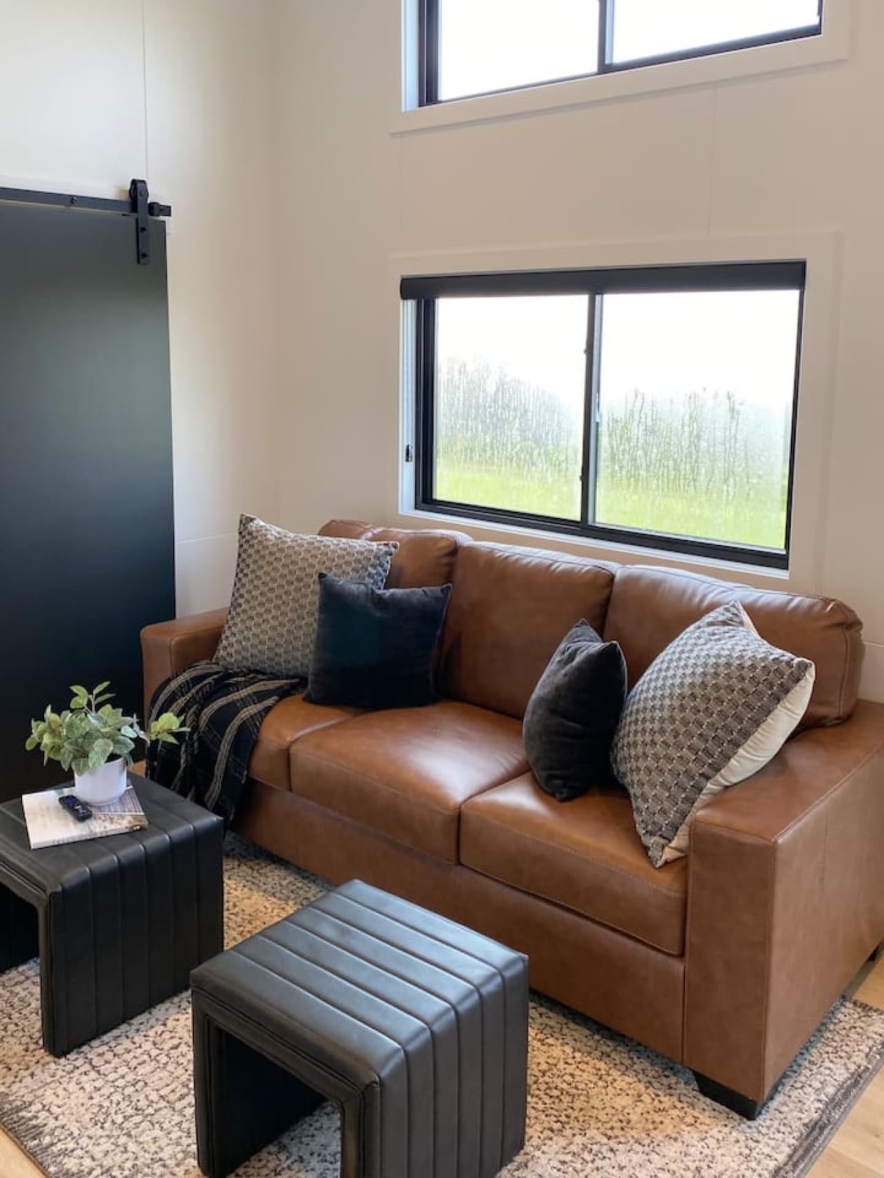 Soft seating, warm lighting, and nature just beyond the window—it’s all about slow mornings and lazy nights.