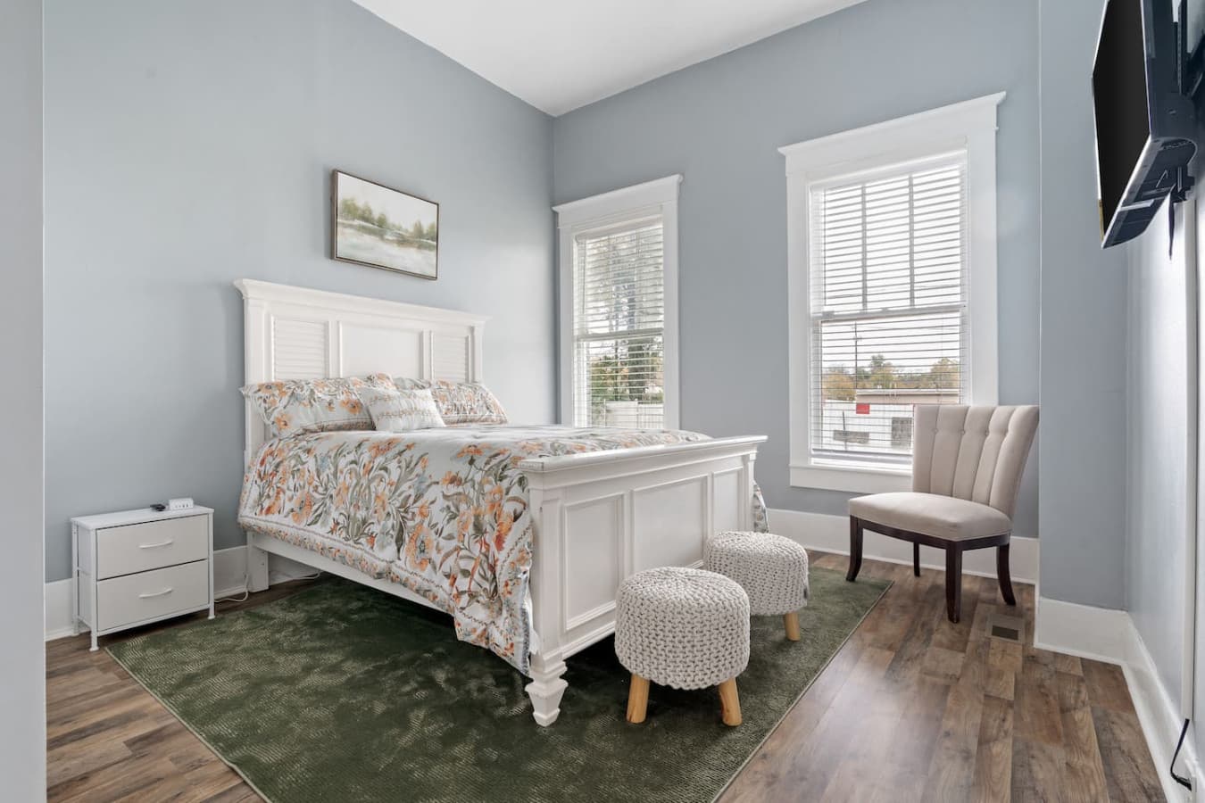 This bedroom provides comfort and warmth for guests who appreciate a quiet night’s sleep.