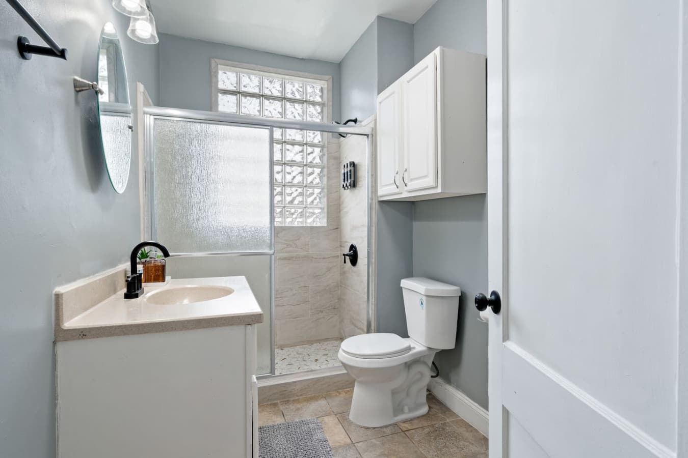 This downstairs bathroom has a shower that does wonders for both stress and bedhead.